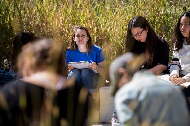 In spring and fall students attend a class outdoors in the garden near the Sanger Center for the ...
